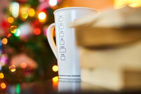 White Coffee Cup at colorful blur background