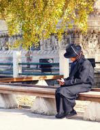 girl with Phone in Autumn park