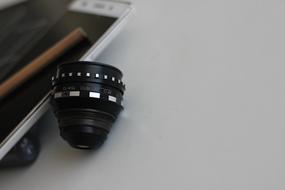 lens, smartphone, pencil
