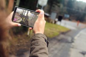 Nokia Lumina Phone in hands in a blurred background