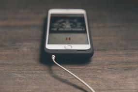 Phone Cellphone Apple on wood desk