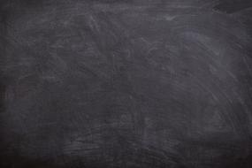 Black board with white chalk traces