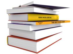 Stack of colorful books at white background