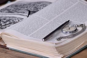 Books and clock and Write