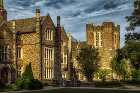 Beautiful Duke University, among the green trees, in Durham, North Carolina, America, under the cloudy sky