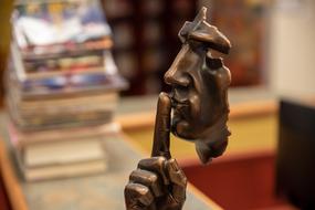 Silence Quiet face statue