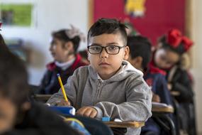 thoughtful boy in class