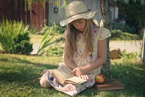 Girl Read grass