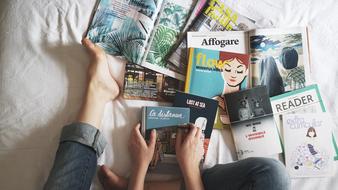 old magazines on the bed