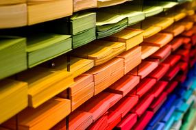 colored paper on shelves at school