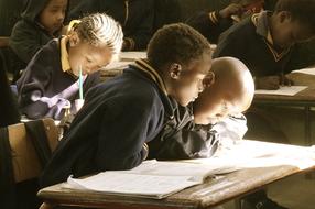 African children at school desks