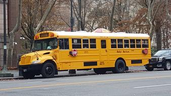 vintage long School Bus on street, usa, New York City