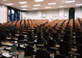 photo of chairs in a large classroom at the university