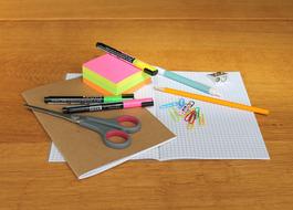 variety of stationery on the desk