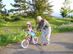 Grandparents and Bicycle Girl