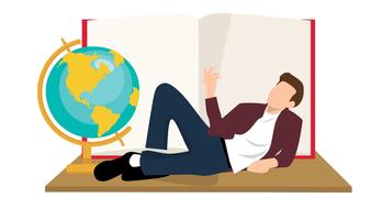 young man laying drawing