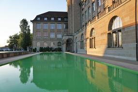 pond on the background of the University of Zurich