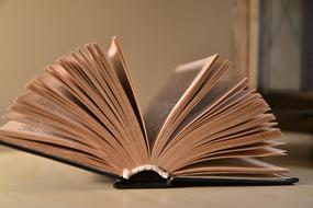 open book on the table in the library