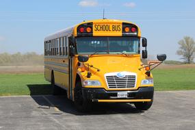 yellow big School Bus on parking