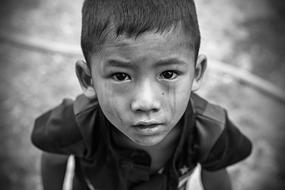 black and white portrait of a thai boy