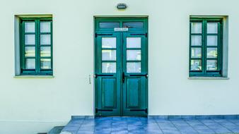 school facade with old blue door