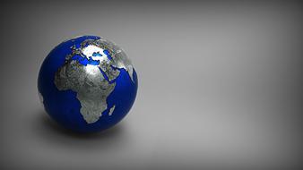 painted blue planet model on a gray background