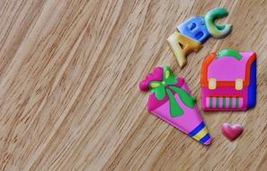 school stickers on the wooden surface