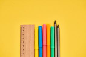 Pen and a wooden ruler