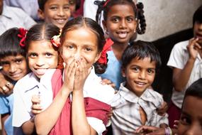 photo of happy indian schoolchildren