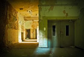 closed metal doors in abandoned building