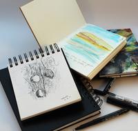 albums for painting on the table