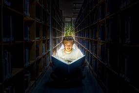 man with magic Book in library, digital art