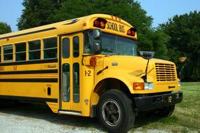 photo of a yellow school bus outdoors