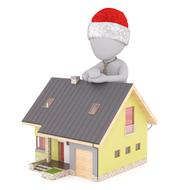 painted white man in christmas hat near the house