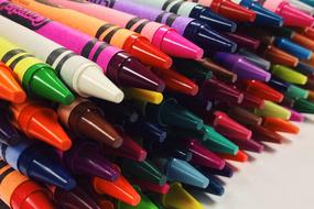 stacked colorful Crayons