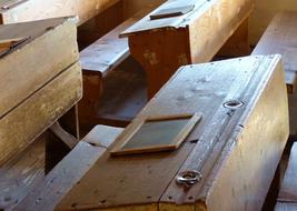 photo of old wooden school desks