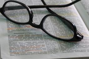 Teacher Word Bible and glasses