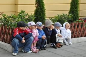 Children sitting in a Row
