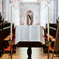 bible on a stand in a church