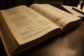 photo of an open bible in a church