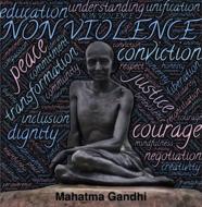 non violence, sculpture of gandhi at colorful word cloud