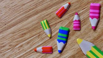 toy colored pencils on wooden surface