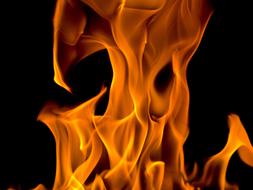 bright photo of flame on a black background