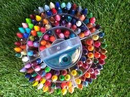 lots of colored pencils as a rainbow palette