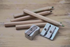 photo of pencils and sharpeners on the table