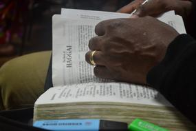 Open Bible and Hand