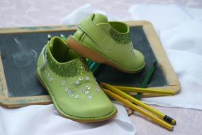 green Shoes and Board and Pens