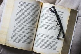 glasses for reading old book