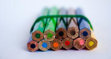 Pencils bandaged with a rubber band