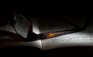 Glasses and Book Reading